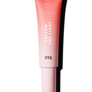 Pink skincare product with 'Follow the Light' text on a white background