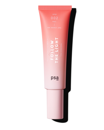 Pink skincare product with 'Follow the Light' text on a white background