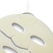 LuxNaura Biodance Radiant Vita Niacinamide hydrogel face mask with serum dripping onto the surface