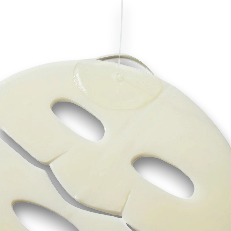 LuxNaura Biodance Radiant Vita Niacinamide hydrogel face mask with serum dripping onto the surface