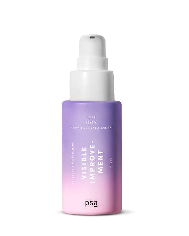 Purple bottle with white spray nozzle on a white background