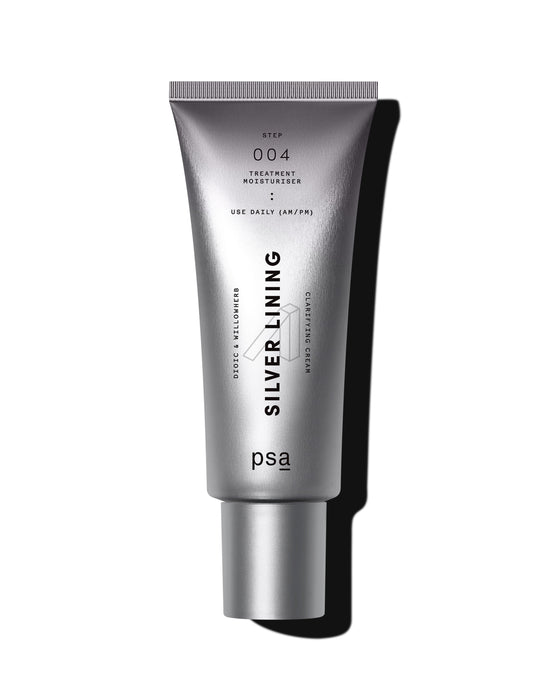 Silver tube of 'Silver Lining' product on a white background